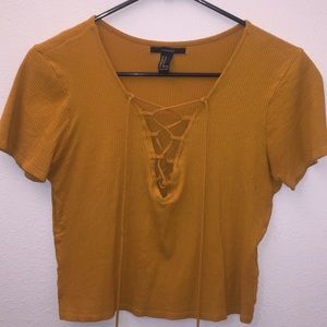 mustard yellow; low cut crossed shirt
